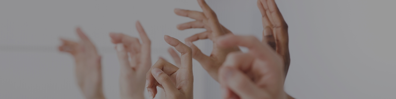 Hands up in a classroom